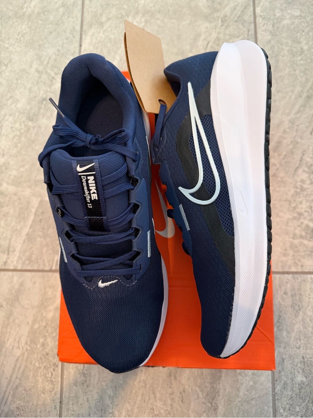 New men’s Sz 9, 10.5 Nike Navy and White Running Shoes